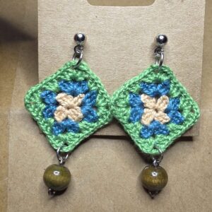 Small granny squares with studs and small dark wood beads