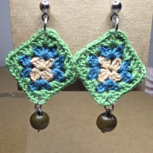 Small granny squares with studs and small dark wood beads